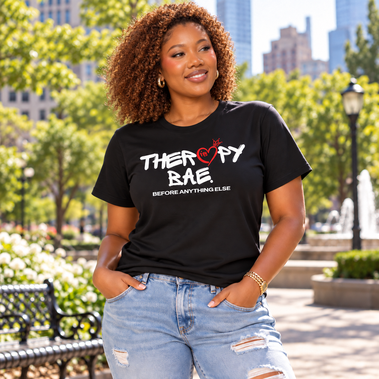 Illustrative model wearing a black Therapy Is BAE T-shirt outdoors